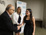 Dr. Eghrari with Noemi Y. Perez and a scholarship recipient